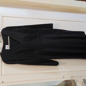 Akris black dress with cross over top and inverted pleated skirt.  VGUC